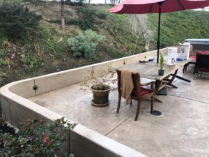 Stamped concrete patio and garden wall