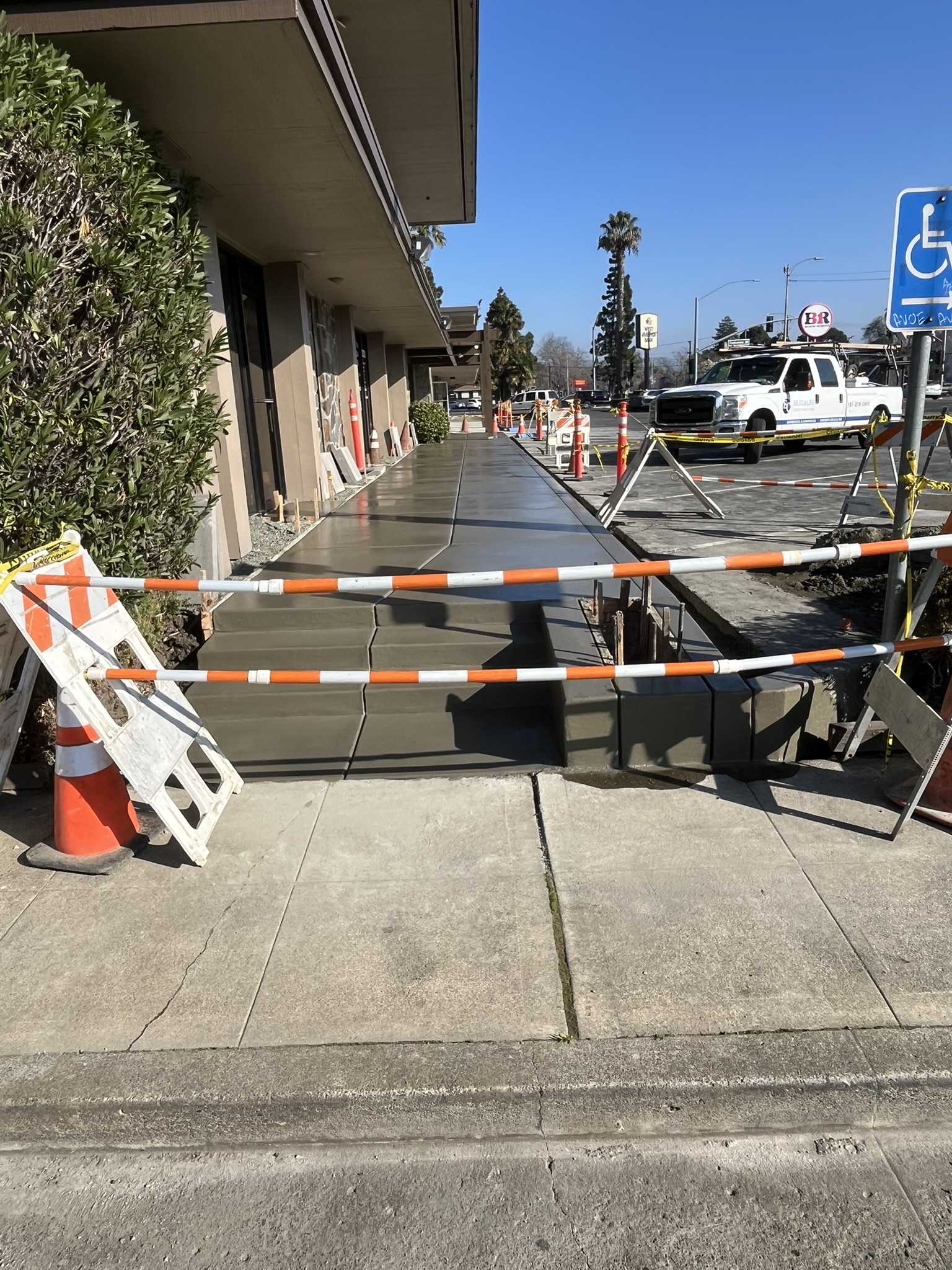 New concrete sidewalk for ECI entrance improvements at a six-business commercial property in Vallejo