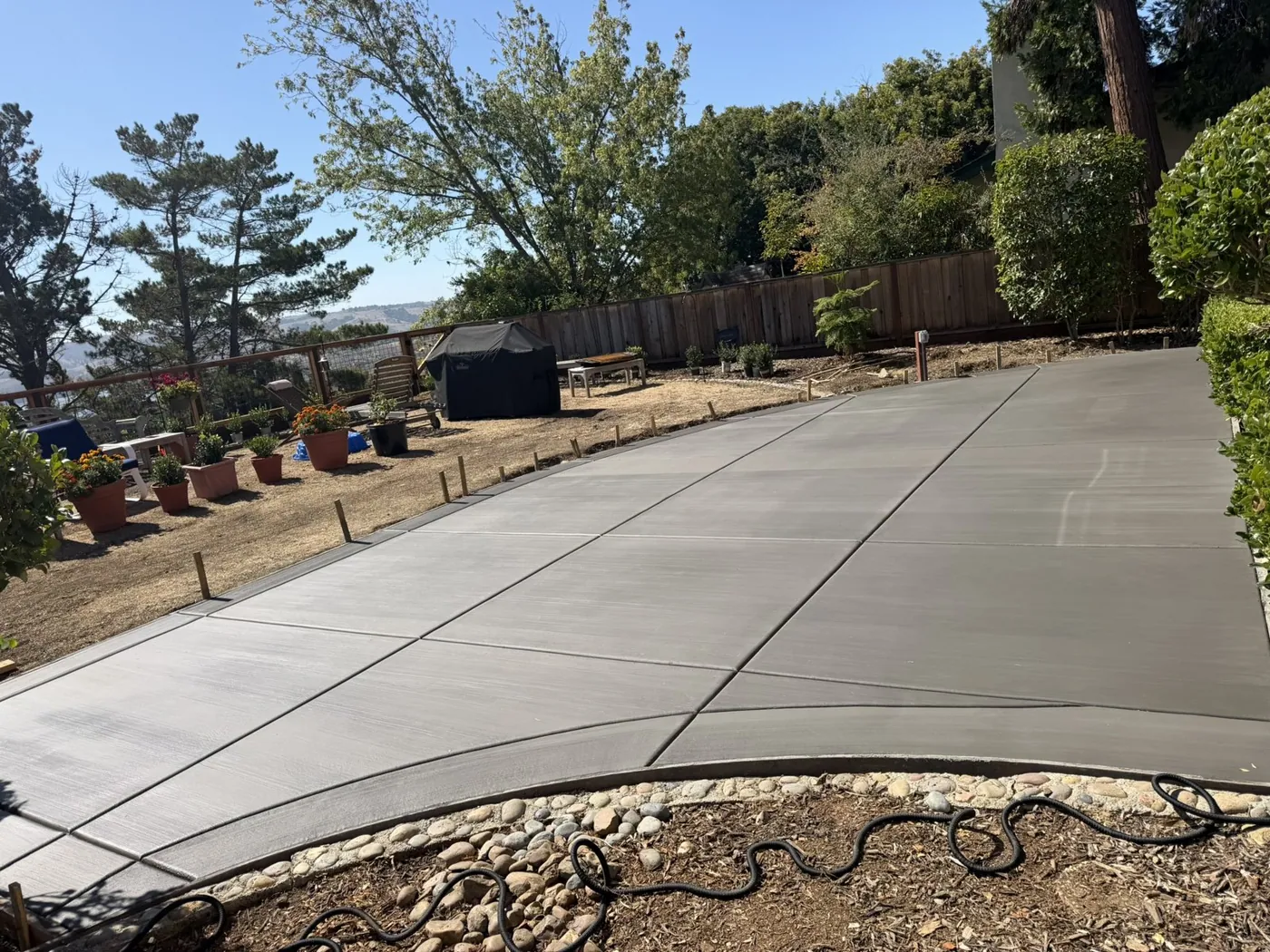 Concrete backyard patio by ECI