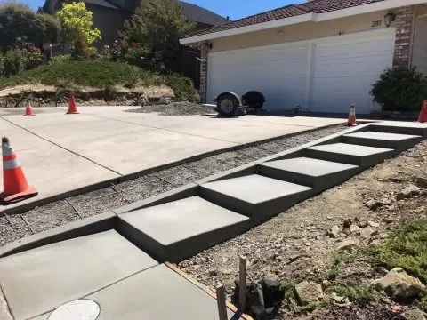 Concrete stairs and driveway extension by ECI