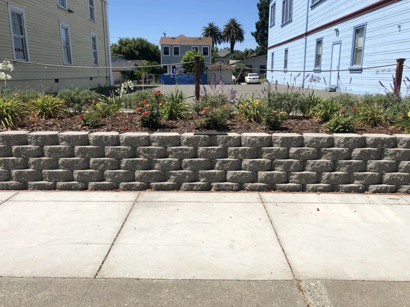 Block retaining wall and city sidewalk by ECI